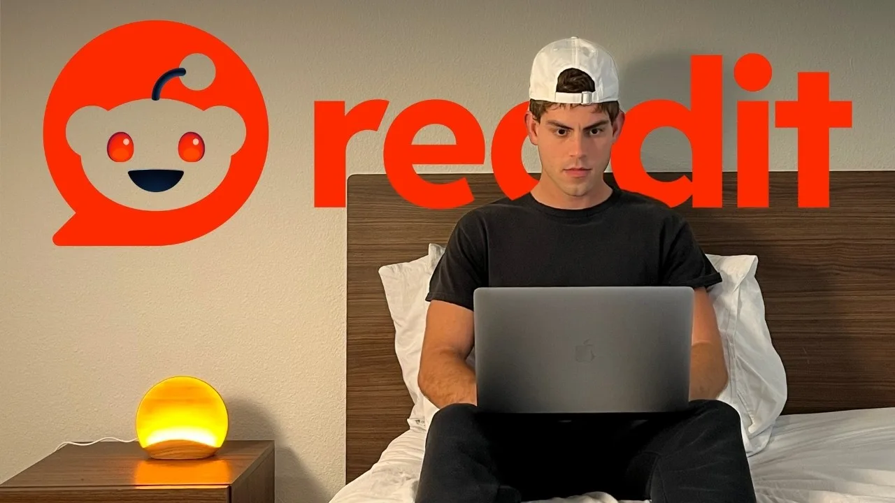 Diego Roshardt at a laptop in front of a large Reddit logo, from the Starter Story interview